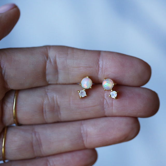 Opal-studs-hand